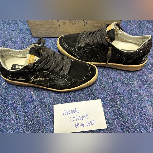 Golden Goose Black and Gold Star Sneakers - Picture 1 of 4